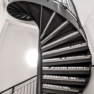 Spiraltrappor interiört – Spiraltrappa med steg av Terrazzobetong. Hulda Mellgrens gata Göteborg.